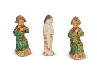 1217
Late Tang Dynasty 618-906 AD or later
A Group Of Chinese Tang-Style Earthenware Fat Ladies
Each appears unmarked
Comprising three ceramic figures, two seated and one standing, each with polychrome glazing, 3 pieces
Largest: 6.25" H x 1.5" Dia.; smaller: 5.75" H x 2.25" Dia.
Estimate: $500 - $700