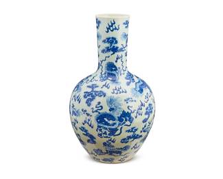 1220
Mid/late 20th century
A Chinese Tianqiuping Blue And White Porcelain Vase
Appears unmarked
The porcelain vase with all-over cloud and lion dog motifs in blue underglaze on a white ground
24" H x 14.5" Dia.
Estimate: $200 - $300