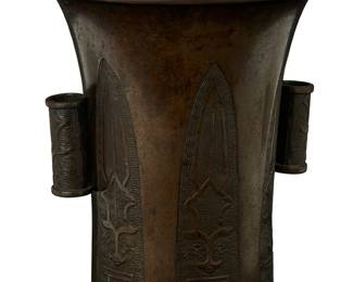 1234
Late 19th/early 20th century
An East Asian-Style Archaistic Bronze Censer
Appears unmarked
Likely Chinese, the flared bronze vessel with opposing cylindrical handles, cast with wrap-around Taotie mask motifs
9.5" H x 7.75" Dia.
Estimate: $300 - $500