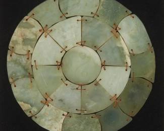 1236
20th century
A Chinese Feng Shui "Bagua" Trigram
With sticker applied to frame verso: Made in China
The possibly nephrite carved stones arranged in panels representing the eight energies in a trigram centering a taijitu "yin-yang" Taoist symbol, surrounded by corresponding astrological zodiac signs, each panel joined by thread and mounted to a black canvas square set in a frame with beveled glass front
Sight: 8" Dia.
Estimate: $400 - $600