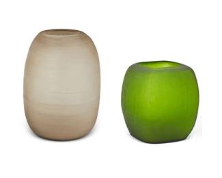 1242
Late 20th/early 21st century
Two Contemporary Art Glass Vases
Taupe vase marked: Made in India
Comprising one taupe-colored satin finish glass vase in lozenge form and an emerald green-colored squared glass vase, 2 pieces
Larger: 15" H x 9" W; smaller: 10" H x 7.5" Dia.
Estimate: $400 - $600