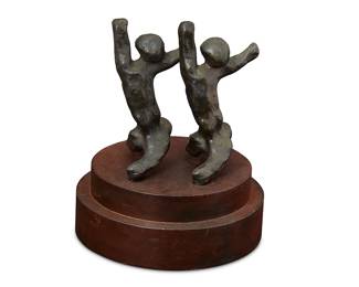 1244
20th century
A Modernist Bronze Figural Sculpture
Appears unmarked
The painted bronze figures posing in tandem, set on a wood base of two graduated concentric circular discs
With base: 9.25" H x 7.875" Dia.
Estimate: $1,000 - $1,500