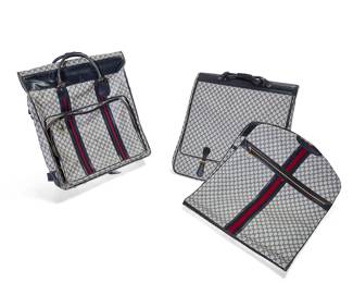 1258
Late 20th century
Three Vintage Gucci Monogram Luggage Items
Three works:

A large Monogram vinylized canvas garment bag
Marked to interior label: Made in Italy / by Gucci; hardware marked: Gucci; one zipper marked: Riri
With red and blue strapping and navy leather trim, with two handles, lockable side straps, collapsible metal framing to interior, and ten hangers
Open: 54" H x 22.5" W x 6" D; closed: 25.5" H x 11.5" D

A Monogram vinylized canvas garment bag with navy leather trim
Marked to snap flap: Gucci / Italy; further marked to interior: 24-011-603; zippers marked: Gucci
Open: 48" H x 23" W; closed: 23" H x 4" D

A slim Monogram vinylized canvas closet bag
Marked and numbered to interior leather: Gucci / Italy / 067; GG logo to outer zipper pull
With red and blue woven strapping and navy leather trim, with exterior pocket, blue canvas lining, Riri zippers, and four hangers
57" H x 23" W; folded: 27.5" H

3 pieces
Estimate: $400 - $600
