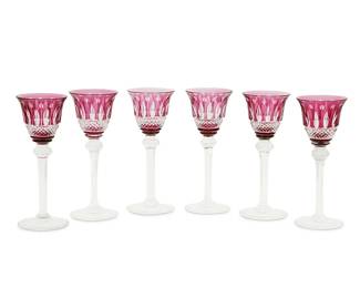 1276
Mid/late 20th century
A Set Of St. Louis "Tommy" Cordial Stemware
Etched to undersides: St. Louis / Cristal / France
The cut class cordials in amethyst coloration, 6 pieces
Each: 5.325" H x 2" Dia.
Estimate: $200 - $300