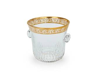 1277
20th century
A St. Louis "Thistle" Ice Bucket
Marked to underside: St. Louis / Cristal / France
The etched glass with scrolled acanthus leaf gilt rim and opposed knob handles, set in original molded foam box
Bucket: 5.875" H x 6.5" Dia.; box: 8" H x 10.625" W x 12.25" D
Estimate: $100 - $200
