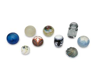 1281
Late 20th century
A Collection Of Art Glass Paperweights
Three signed to the underside: Grant; one marked: D. Shura / Orient and Flume / 1984; one marked: NGS / 139 / 5 '77; four appear unmarked
Nine art glass paperweights comprising three by Grant Randolph Studios, one by Orient and Flume Art Glass, one by Nourot Glass Studio, and four unmarked of varying size and finish, 9 pieces
Largest: 4.25" H x 2.25" Dia.; smallest: 1.5" H x 2" Dia.
Estimate: $300 - $400