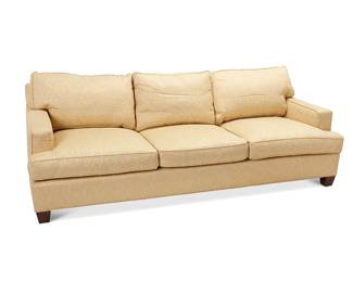 1285
Late 20th/early 21st century
A Baker Upholstered Three-Seater Sofa
Appears unmarked
With gold-colored silk and linen blend upholstery, set upon four squared wood legs
34" H x 96" W x 39" D
Estimate: $700 - $900