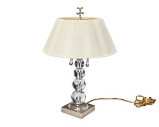 290
Late 20th/early 21st century
A Contemporary Glass Spheres Table Lamp
Appears unmarked
The two-light lamp with graduated stacked glass, teardrop-shaped glass pulls, spheres and a cloth shade, electrified
22" H x 15" Dia.
Estimate: $100 - $200