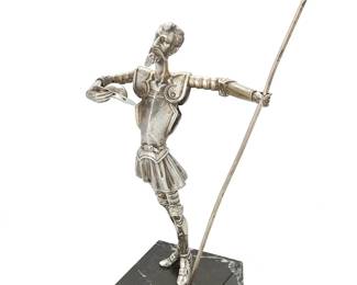 1300
20th century
A Contemporary Silver Knight Sculpture
Marked: Silver [possibly "GENA"] / [star in an oval]
Depicting a Spanish-style knight, possibly Don Quixote, on a marble base
Overall: 16" H x 8.25" W x 4" D
Estimate: $300 - $500