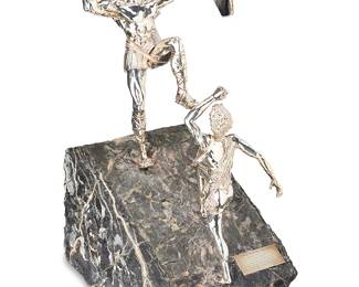 1302
Yaacov Heller
b. 1941
"David Slaying Goliath," Late 20th Century
Sterling silver, gold wash, and slate
Signed to the shield: Yaacov Heller / 17 D; further marked: 925
18" H x 7.5" W x 13" D
Estimate: $200 - $300