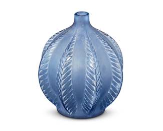 1318
Mid-20th century
A Bud Vase After Lalique
With spurious stencil mark to underside: R. Lalique
The glass bottle after the "Maline" vase, with fern form vertical ribs
4.75" H x 4" Dia.
Estimate: $200 - $300