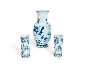 1321
20th century
A Group Of Chinese Blue And White Porcelain Vases
Each marked to the underside in blue underglaze bearing an apocryphal reign mark for Kangxi Period (1654-1722)
Comprising one larger baluster form ceramic vase and a pair of smaller cylindrical vases, each with continuous figural scenes in blue underglaze on a white ground, 3 pieces
Larger: 15" H x 5.25" Dia.; smaller: 7.75" H x 3.5" Dia.
Estimate: $400 - $600