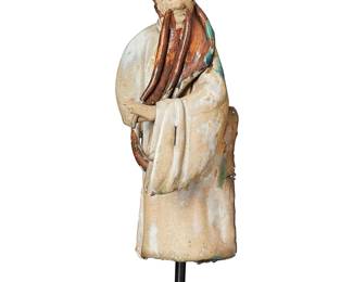 1327
Qing Dynasty 1644-1911 or later
A Chinese Qing Dynasty Glazed Earthenware Temple Figure
Appears unmarked
The ceramic figure, wearing scholar's robes, glazed with transparent, blue, and iron oxide underglazes, with later-added stand
With stand: 13" H x 4" W x 4.5" D
Estimate: $200 - $400