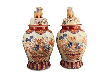 1334
Mid/late 20th century
A Pair Of East Asian-Style Porcelain Lidded Vases
Each stamped to the underside bearing an apocryphal reign mark for Qianlong Period (1736-1795)
Each large vase with guardian lion finials and decorated with floral motifs in a vaguely Chinese Imari palette, 2 pieces
Each: 28.5" H x 14" Dia.
Estimate: $100 - $200