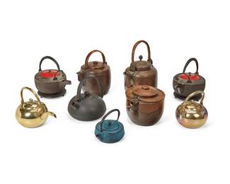 1341
20th century
A Group Of East Asian Teapots
Comprising three hammered copper pots, two silvered metal pots, and four cast iron pots, two with enameled wood lids and conformingly designed heat plates and one with interior strainer basket, 9 pieces
Largest: 10.25" H x 8.325" W x 6.25" D; smallest: 4.5" H x 5.325" W x 4.325" D
Estimate: $300 - $500