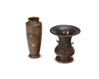 1344
20th century
Two Diminutive Japanese Bronze Vases
Each appears unmarked
Comprising one modified baluster-form vase with a flared rim and one sleeve-form vase, each with flora and fauna decoration in low relief, 2 pieces
Larger: 5.5" H x 2.25" Dia.; smaller: 4.25" H x 4.25" Dia.
Estimate: $700 - $900