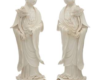 1351
Republic Period 1912-1949 or later
A Pair Of Chinese Dehua-Style Porcelain Guanyins
Each marked to the underside with a red ink stamped character
Each clutching naturalistically rendered lotus flowers and raised atop elaborately rendered lotus pond finials, 2 pieces
Each: 24" H x 7" W x 7" D
Estimate: $150 - $250