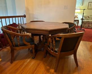 Octagonal Game/Dining Table Set with 2 leaves and 4 Black Cushioned Rolling Chairs