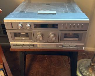 Sears AM/FM Stereo System with 8 track player and dual cassettes and record player