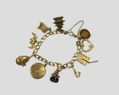 Fine 14K Yellow Gold Charm Bracelet 33.1 Grams
