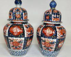 Pair of antique Japanese imari lidded porcelain Ginger jars
