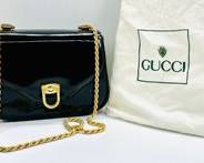 Vintage GUCCI Black Leather W Gold Color Metal Flap Down Closure And Gold Tone Metal Chain W Dust Bag Included
