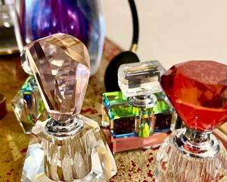 Perfume bottles including IRICE.
