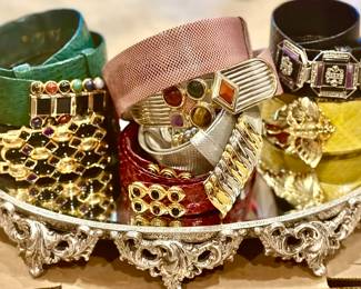 OVER 50 BELTS BY JUDITH LEIBER AND ALEXIS KIRK.  LIZARD, SNAKESKIN, AND ALLIGATOR.