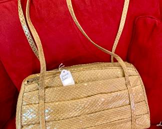 Judith Leiber snakeskin.