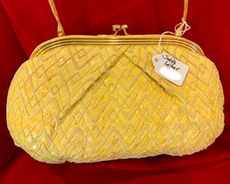 Judith Leiber snakeskin purse.