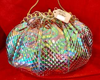Judith Leiber irridescent handbag with stones.