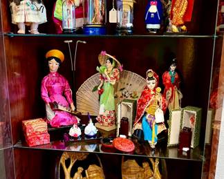 Glass cabinet with some Asian finds.