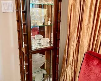 LOVE THE BAMBOO STYLE CURIO CABINET.