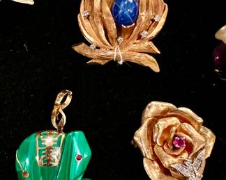 14k pink sapphire with diamond butterfly rose pin.  18k gold diamond fire brooch with blue stone.  14k malachite elephant.