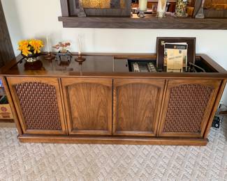 Mid century modern Magnavox stereo record player with original paperwork and remotes