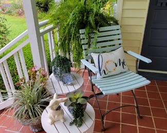 Chair, tables and plants 
