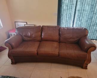 OFF SITE
Tan leather Sofa $350