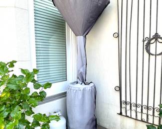 $300; 7' tall; outdoor propane (4800 BTU) heater with cover; shiny chrome and looks brand new in great condition; host the hottest party in town!