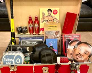 man cave goodies! games, speakers, sports collectibles;                    $48; brand new red trunk