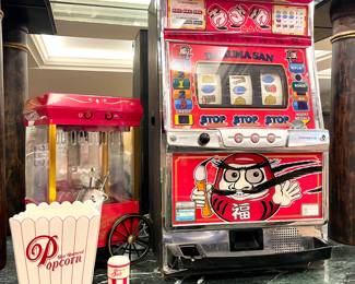 $30; popcorn machine;                                                                                       $18; Williams Sonoma ceramic popcorn bowl;                                                                             $6; Williams Sonoma ceramic salt shaker;                                                   SOLD; 19 x 14.5 x 32; counter-top slot machine