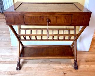 $150; 32 x 18 x 30; unique, rattan side table with book basket, drawer and open, bottom shelf and hoof feet