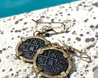 $50; sterling earrings