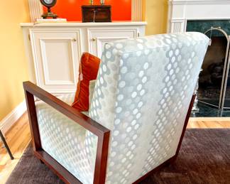 $500 each (2 available); 28 x 37 x 32; custom-upholstered armchair with walnut frame by American Leather Co. and matching lumbar pillow (rear view);                                             $24; pumpkin-colored velvet pillow with contrasting piping