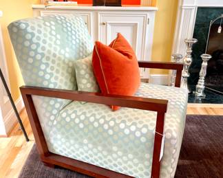 $500 each (2 available); 28 x 37 x 32; custom-upholstered armchair with walnut frame by American Leather Co. and matching lumbar pillow;                                             $24; pumpkin-colored velvet pillow with contrasting piping