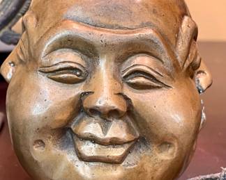 $50; 3.5d x 4h; 4-sided, bronze sculpture