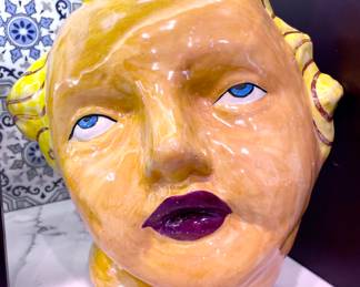 $100; 12 x 5 x13; hand-made, ceramic face wall hanging