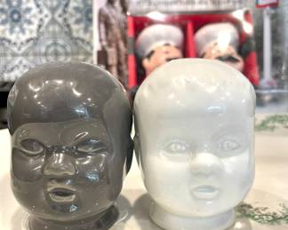 $18; 3" tall; gray and white baby head S&P set