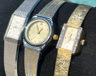 $60 Gold stripe, Citizen, ladies. $50, Silver Seiko ladies wristwatch. Gold - no longer avail. 
