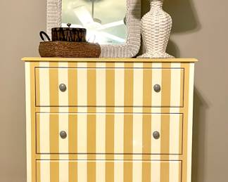 $250; 37 x 20 x 41; whimsical, striped, three-drawer chest with bun feet; some minor scratches on the top;                                                                  $30; 24 x 30; white, wicker mirror;                                                                        $48; 15 x 27; white, wicker light;                                                 $12; wicker basket with handles;                                                              $18; fossil-look box with silver handle and feet                  