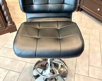 $120 each (6 available); 18 x 20 x 33.5-42; Zuo Modern adjustable bar stool in black and chrome with foot rest (front view)